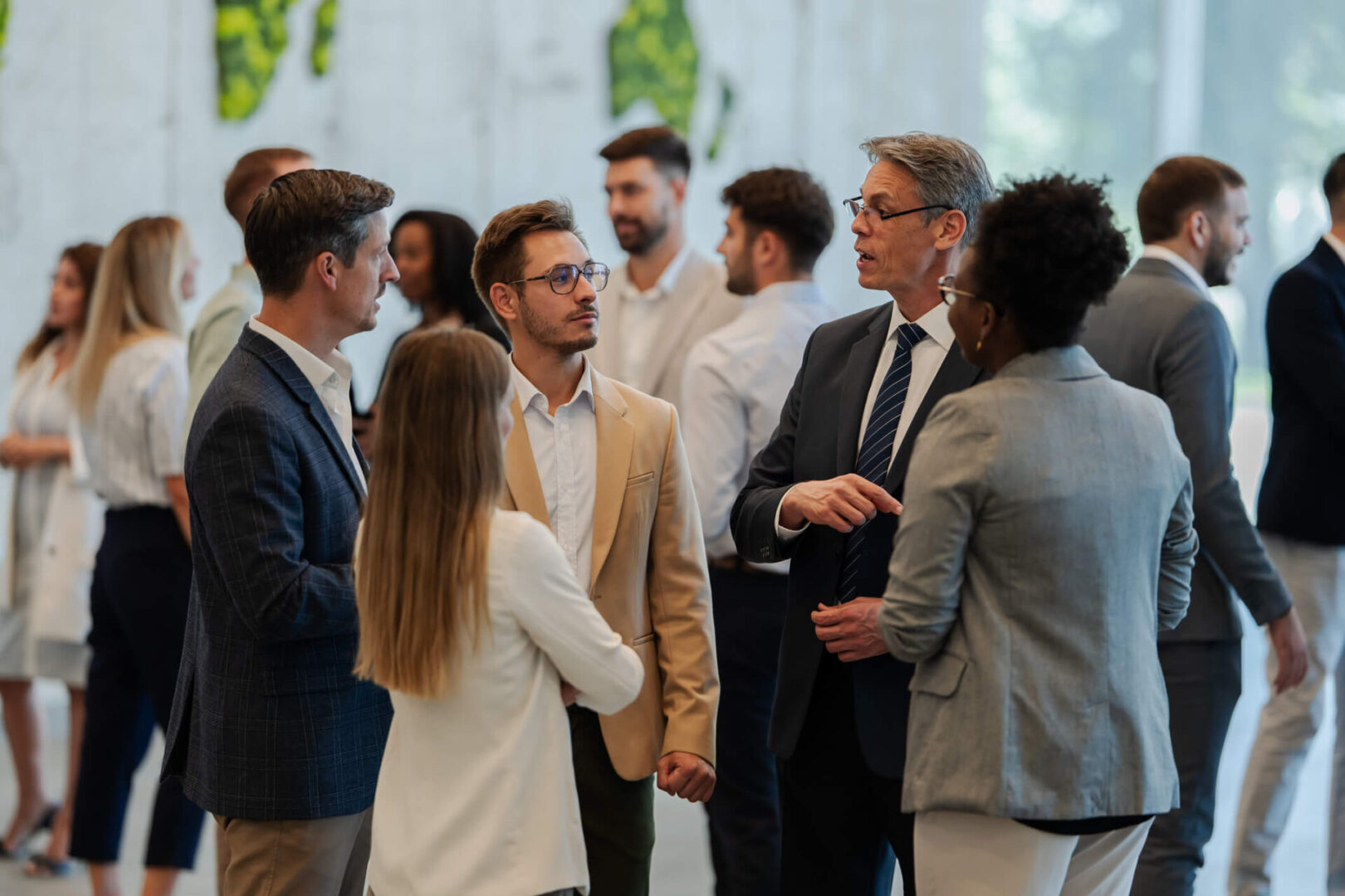 Business professionals networking at corporate event